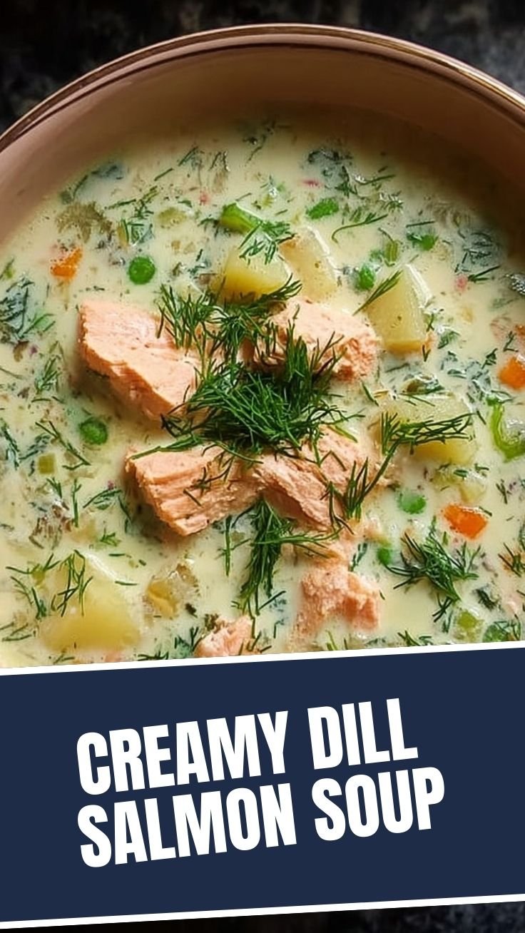 A bowl of creamy dill salmon soup garnished with fresh dill sprigs.