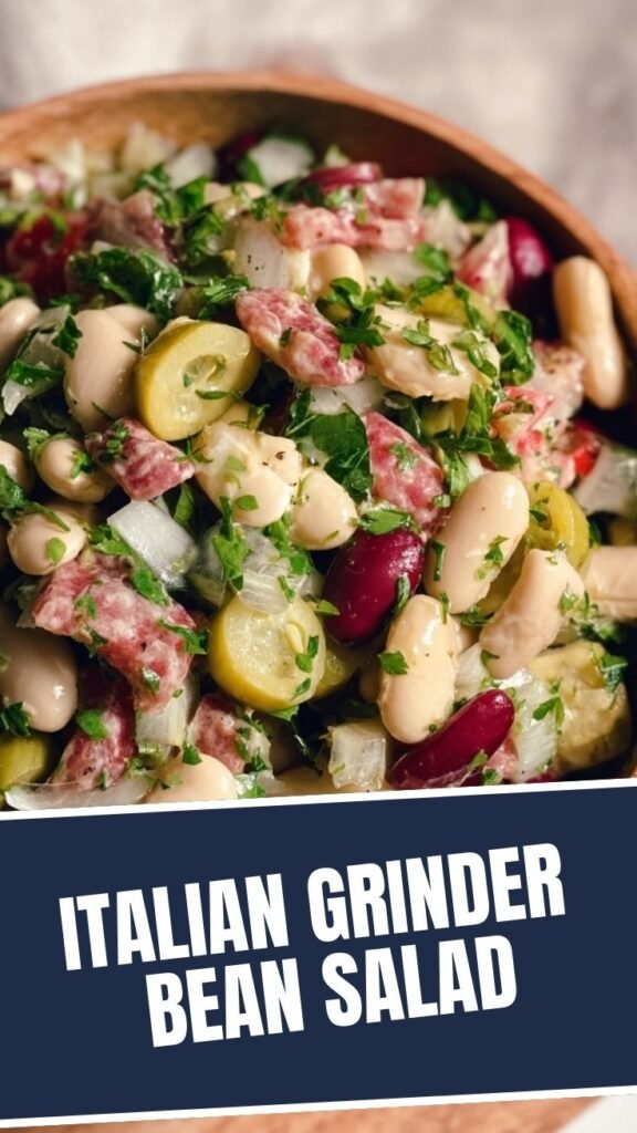 A vibrant Italian grinder bean salad with mixed beans and fresh vegetables.