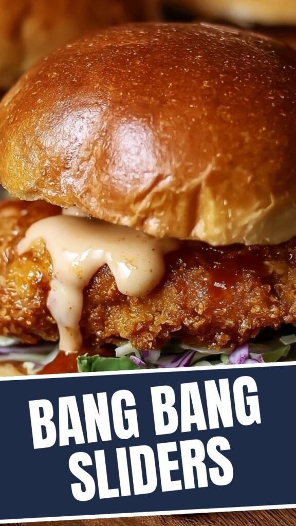 Freshly made bang bang chicken sliders with a creamy sauce