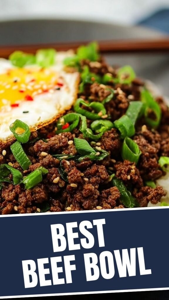 A vibrant Korean ground beef bowl topped with green onions and sesame seeds, ready to eat.