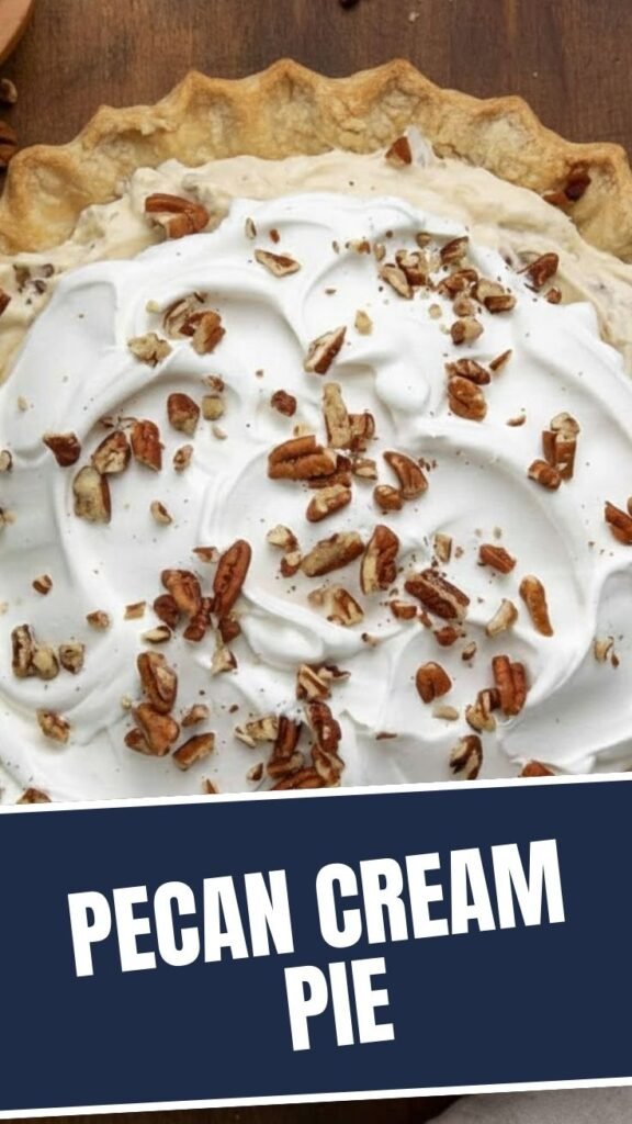 A full pecan cream pie with a golden crust on a serving dish.