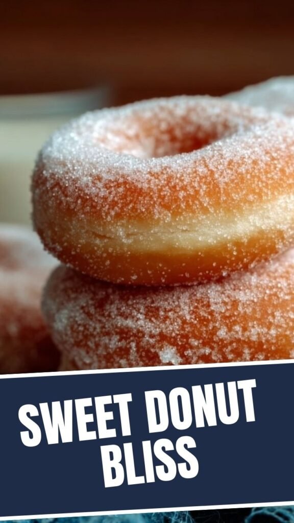 A freshly made, fluffy yeast doughnut covered in sugar glaze.