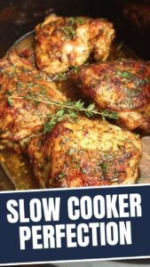 Cooked Crockpot chicken thighs in a slow cooker.