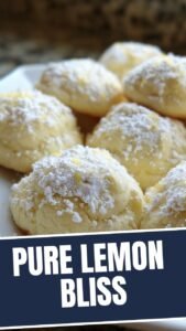Freshly baked lemon ricotta cookies on a cooling rack