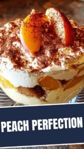 A serving of delicious peach tiramisu in a clear glass dish, layered with cream and peaches.
