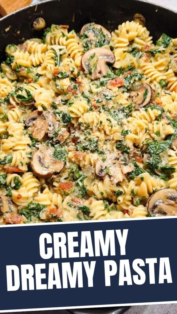 A vibrant bowl of spinach mushroom pasta, rich with greens and earthy mushrooms