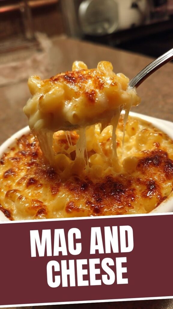 A steaming bowl of classic mac and cheese, rich and golden