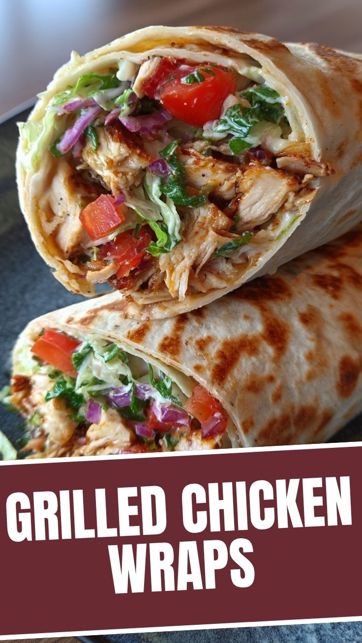 A close-up of a chicken wrap, showcasing its fresh ingredients and perfect fold.