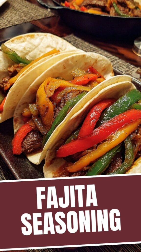A hot skillet of colorful veggie fajitas with bell peppers and onions