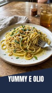 A close-up of a perfectly cooked Aglio e Olio pasta dish, glistening with olive oil and garlic.