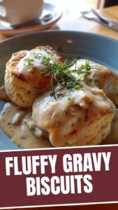 A plate of fluffy biscuits and gravy, a classic Southern breakfast.