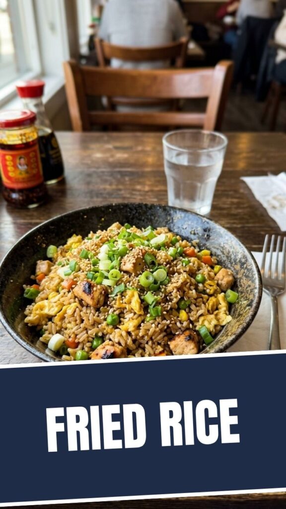 A classic fried rice dish with rice, vegetables, and protein.