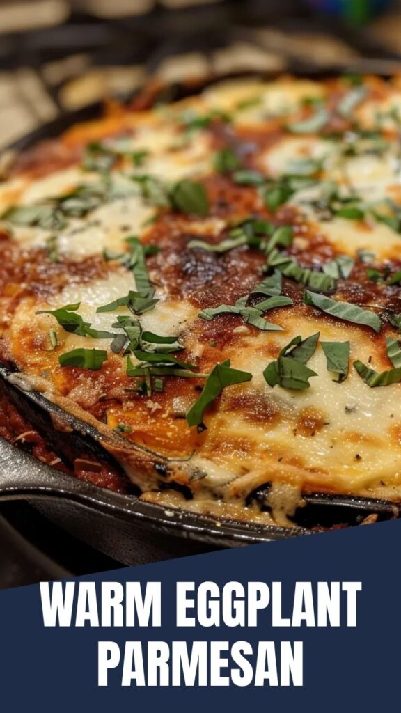 A steaming dish of classic Eggplant Parmesan ready to serve.