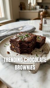 A close-up of delicious chocolate brownies with a rich, fudgy texture