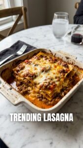 A freshly baked lasagna with melted cheese on top