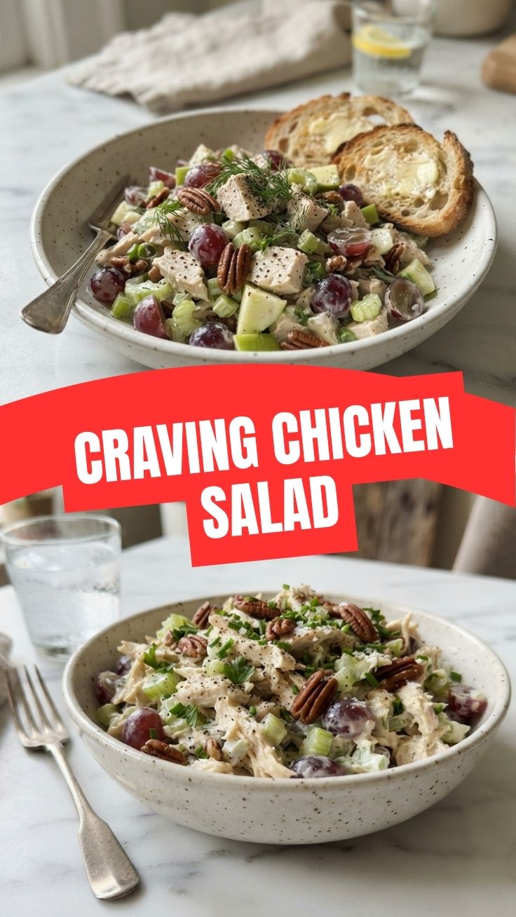 A bowl of freshly made chicken salad with celery and herbs.