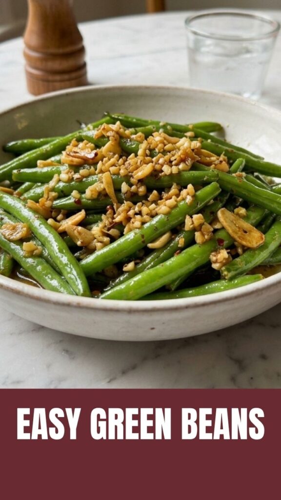 A vibrant dish of green beans tossed with minced garlic