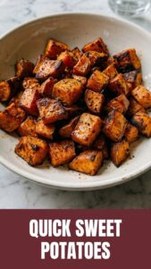 Close-up of perfectly seasoned roasted sweet potatoes with herbs